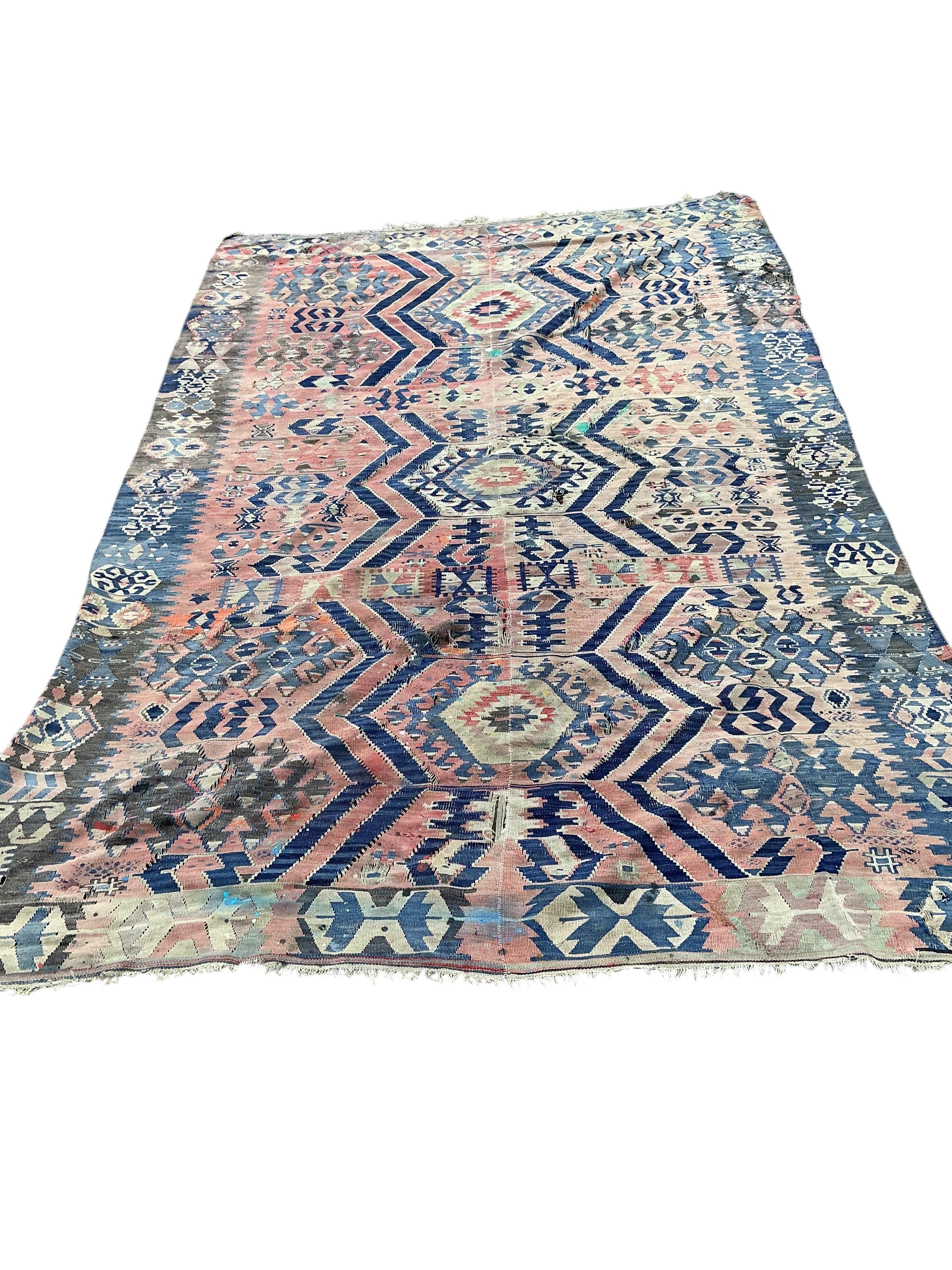 A Kilim polychrome flatweave carpet, 298 x 199cm